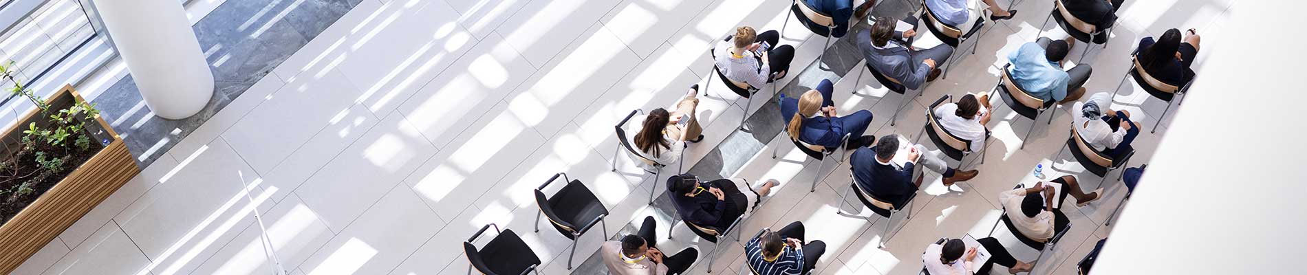 overview-of-people-at-conference-during-daytime-listening-to-speaker-at-ng911-goes-to-washington-event